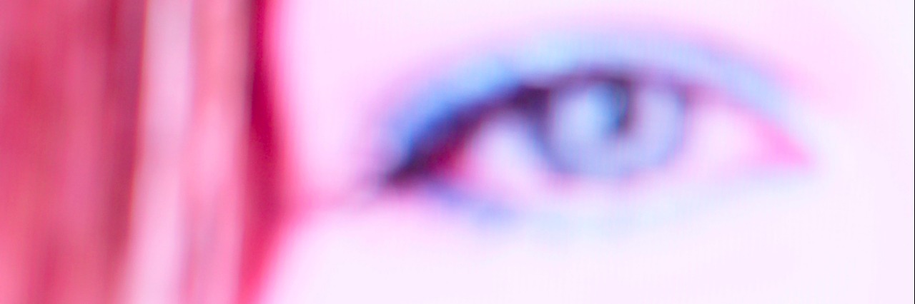 Blurry close-up of eye of woman