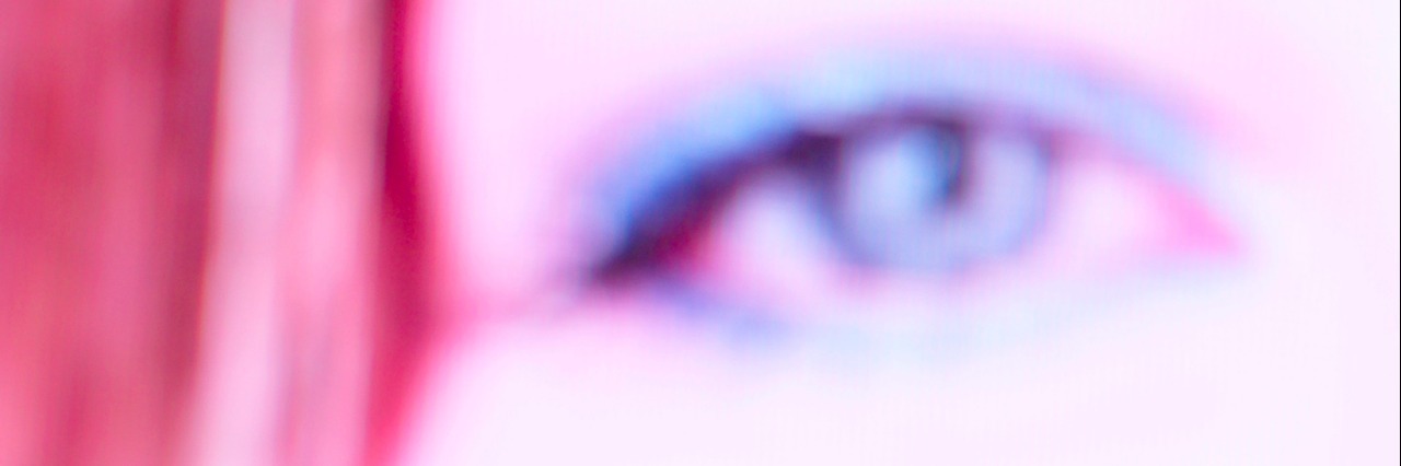I Didn't Lose Myself to Chronic Illness. I Have Been Finding Myself. Blurry close-up of eye of woman
