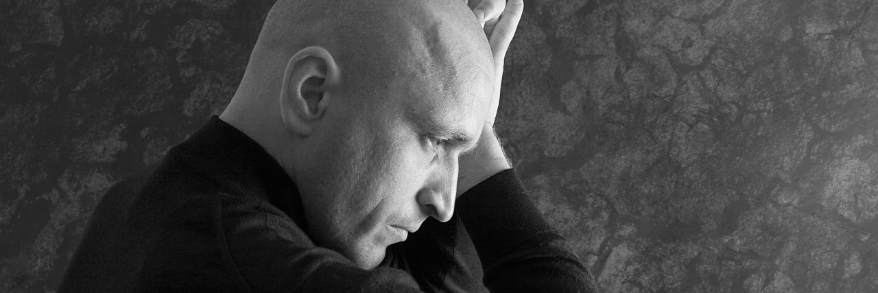 Feeling Depressed and Suicidal and Owning My Shame Portrait of a bald man