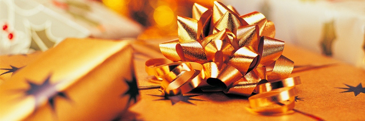 7 Great Gift Ideas for a Friend With POTS presents wrapped in gold paper