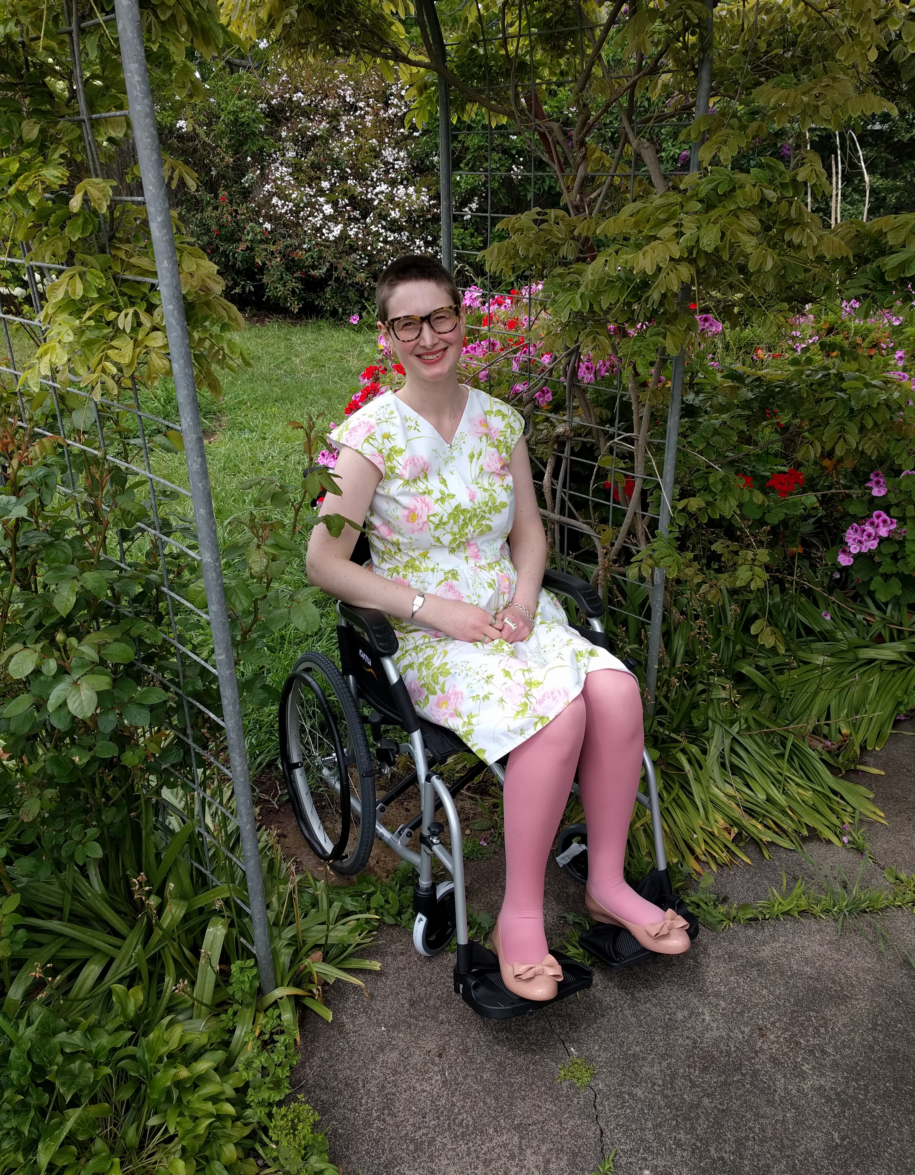 woman in wheelchair in a garden