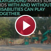 video play button in front of accessible playground