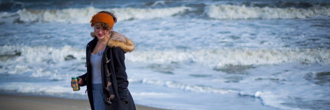 Dealing With Grief After My Sister's Suicide woman at the beach