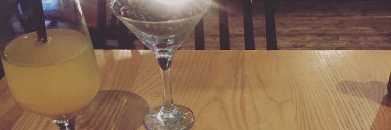 Socializing and Attending Events With Hypothyroidism two drinks and a bowl of fries on a table at a restaurant