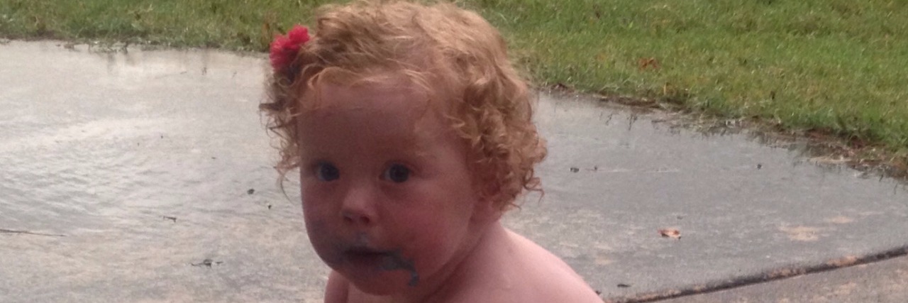 A Thank You to the Doctor Who Helped My Baby With Half a Heart baby playing with chalk