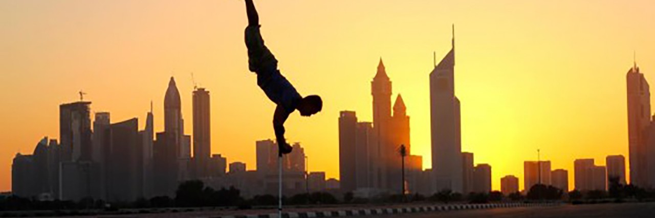 Acrobat With a Disability Challenges Ableism Dancer Jean Sok.
