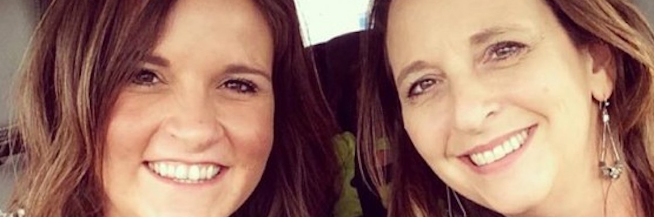 A Thank You Letter to My Mom, Who Helped Me Through My Depression A young woman and her mom smiling for a photo in the car.