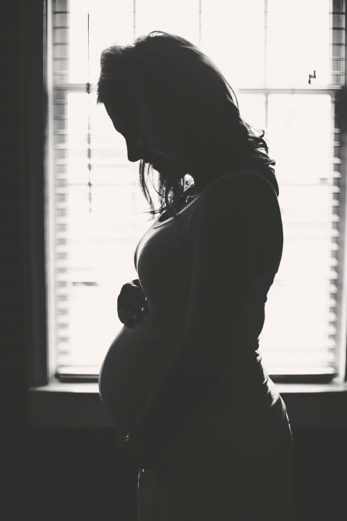 pregnant woman black and white photo