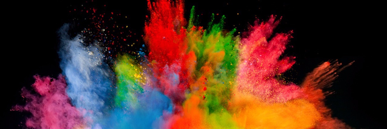 colored dust explosion on black background