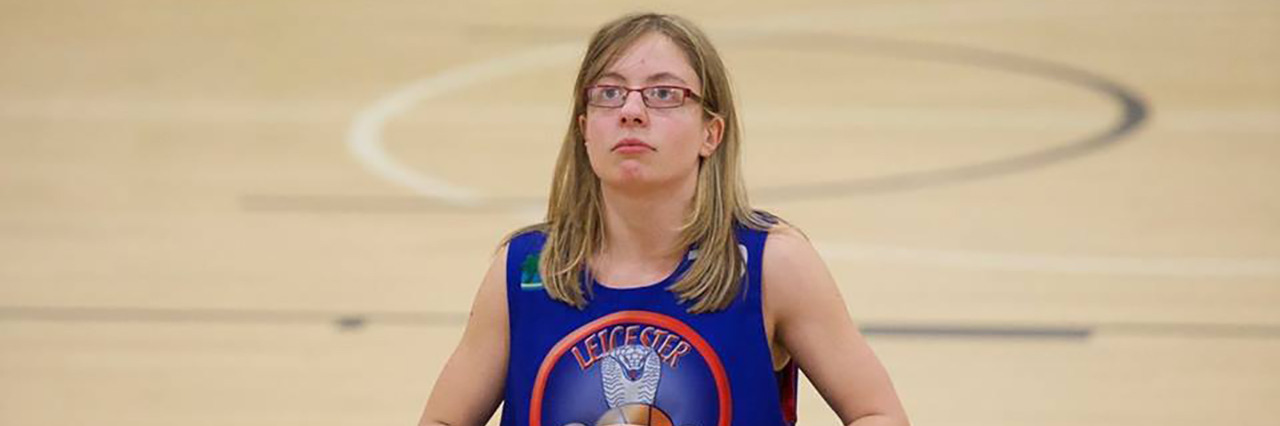 Common Situations I've Faced as a Wheelchair User Rachel-Ann Edwards playing wheelchair basketball.