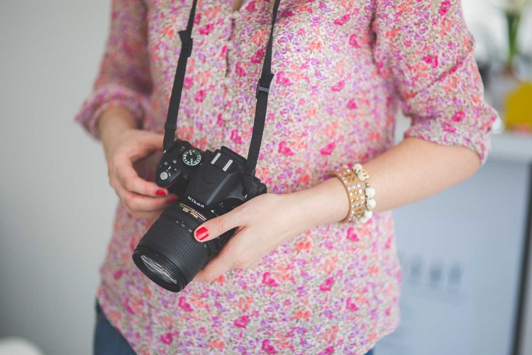 woman/mom holding a camera