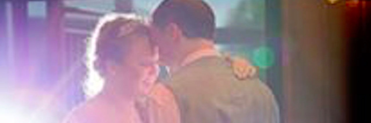 A Thank You to My Husband During My Fibromyalgia Flare-Up husband and wife on wedding day