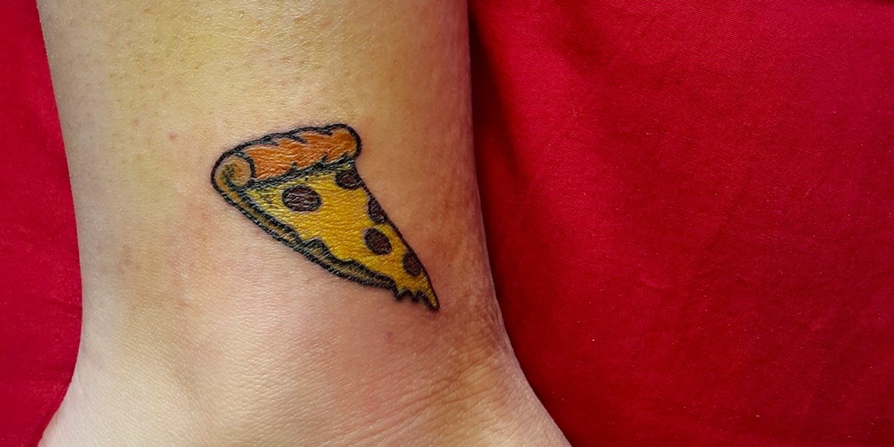 Small Pizza Tattoo On Face