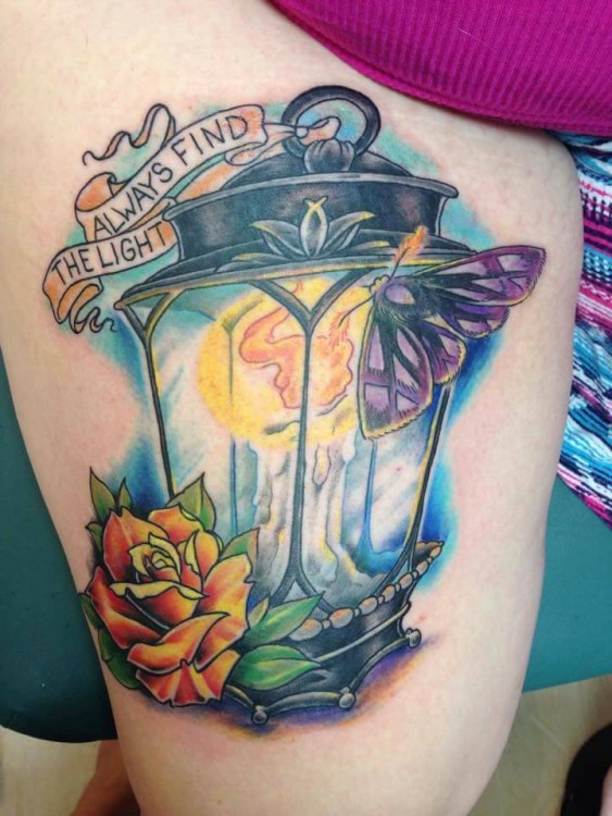 tattoo of lamp and flowers with words always find the light