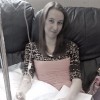 girl sitting on couch with iv in arm