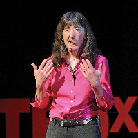 Dawn Shaw giving a TEDx talk.