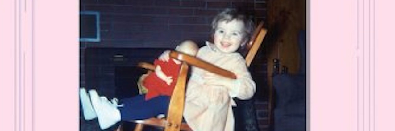 A 50-Year Rare Disease Experience With Mucolipidoses little girl smiling
