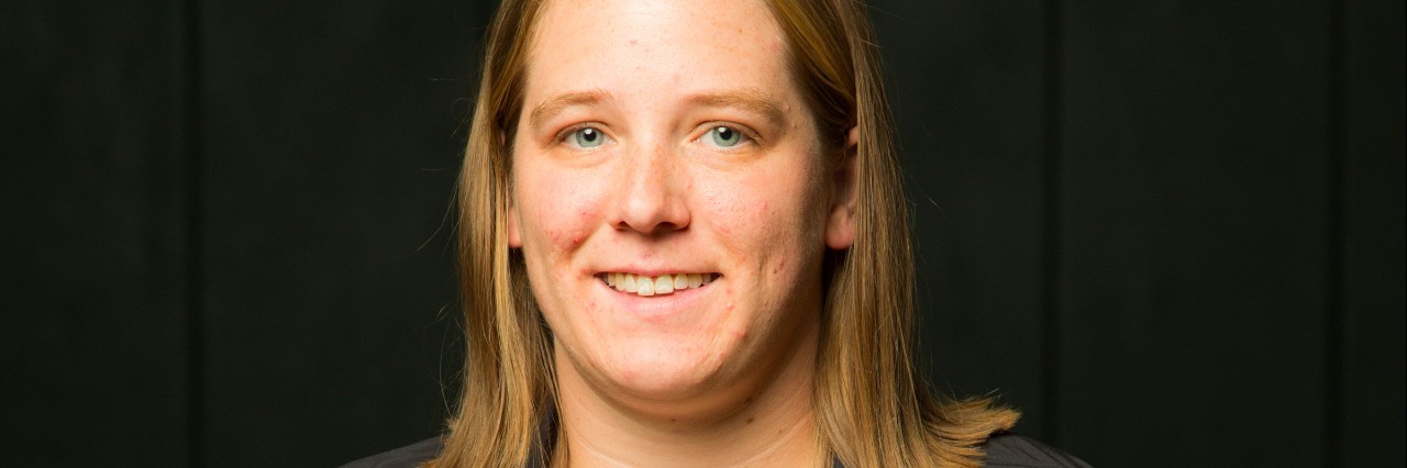 What Working Means to Me as an Autistic Person woman holding a basketball