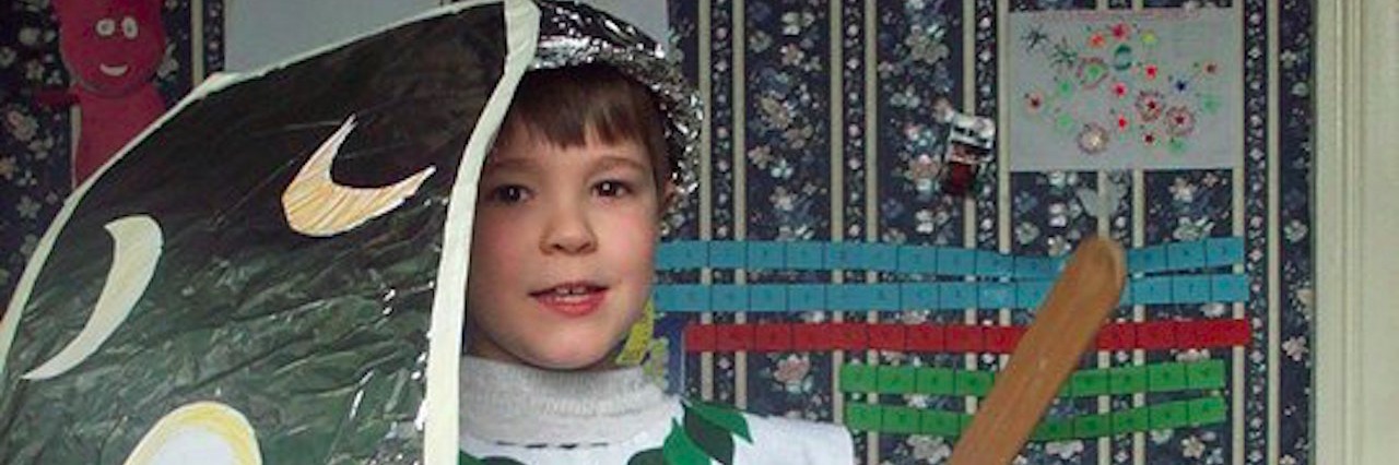 An Autistic Person's View of Applied Behavior Analysis Therapy young boy dressed for medieval banquet