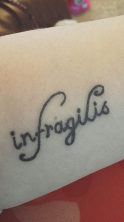 A tattoo of the word "ingragilis"