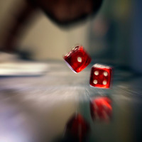 an illustration of someone rolling dice,