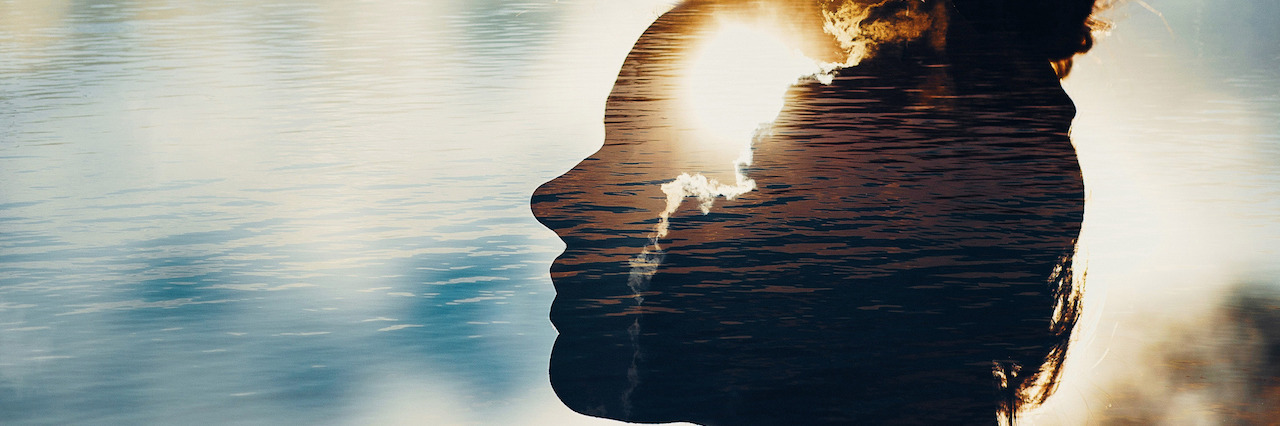 When You Are Dealing With PTSD After Losing Someone to Suicide A double exposure of a woman and the sun in her head