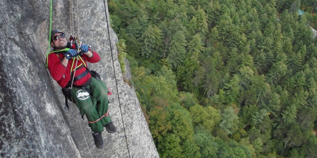 Why I Love Rock Climbing as a Person With a Disability Enock climbing Cathedral Ledge.