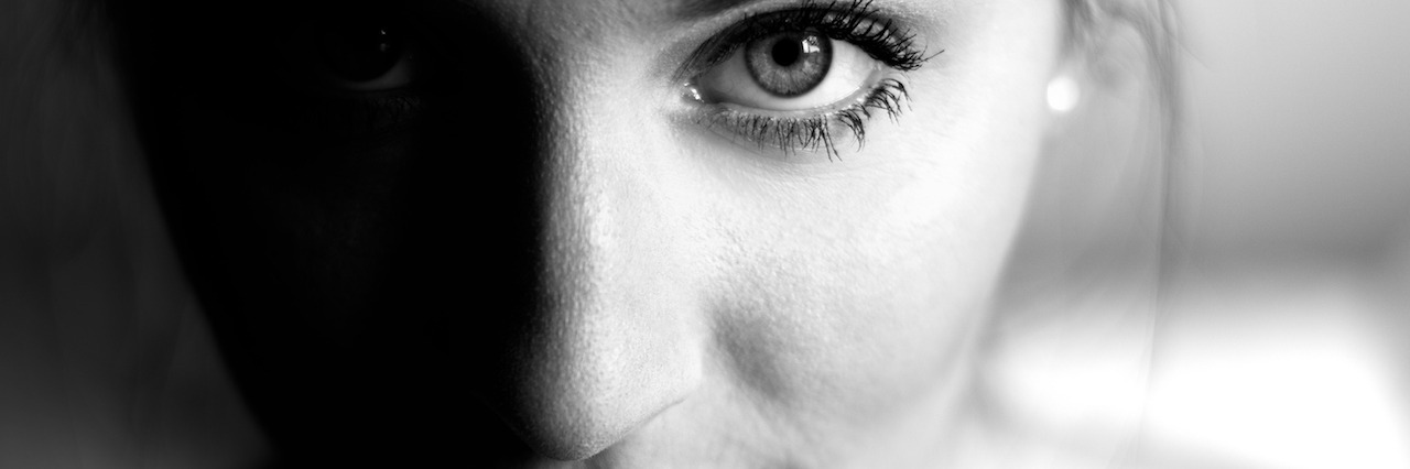 black and white upclose headshot of a woman