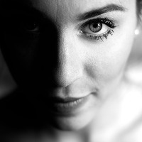 black and white upclose headshot of a woman