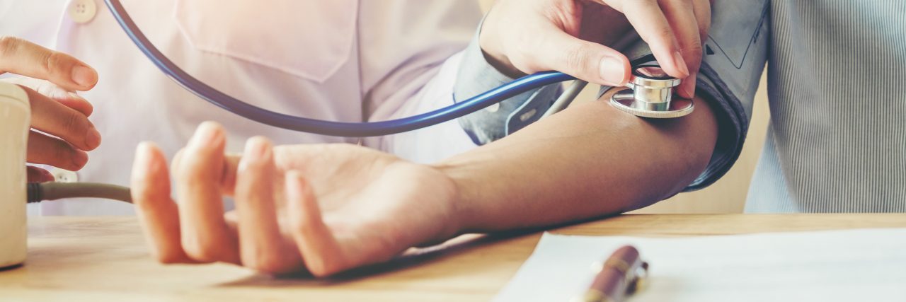 Dear Clinical Students: Here's What Patients Like Me Want Most Doctor Measuring arterial blood pressure woman patient on right arm Health care in hospital