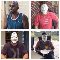 four people with whipped cream on their face after smashing a pie