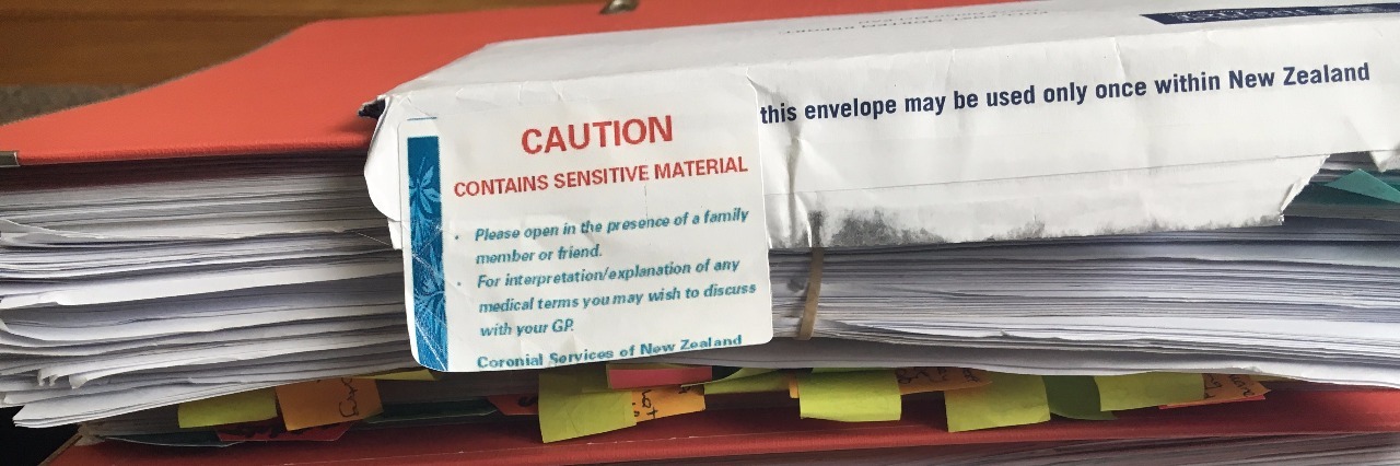 "Caution: Contains sensitive material" label