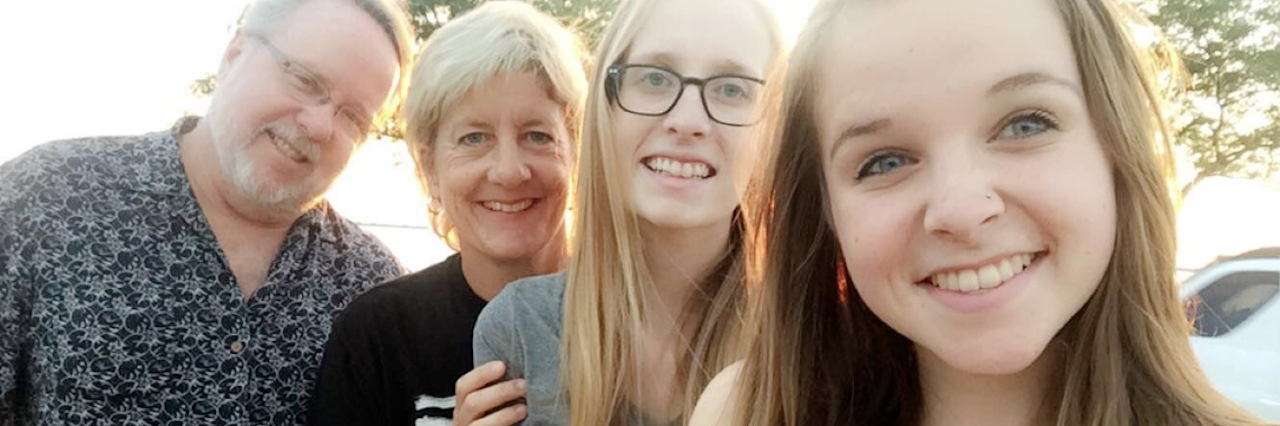 Thanking Parents Who Are Caretakers For Daughter With Gastroparesis selfie of a mom, dad, and their two daughters