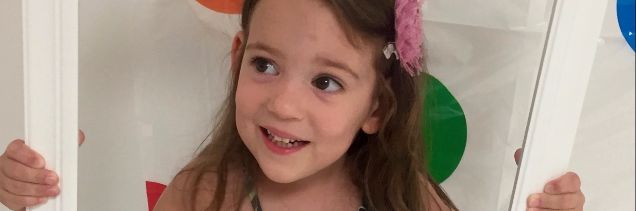 My Daughter's Prematurity Will Always Be Part of the Conversation, and That's OK young girl on her first day of preschool