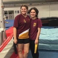 two women on their college’s trampolining team