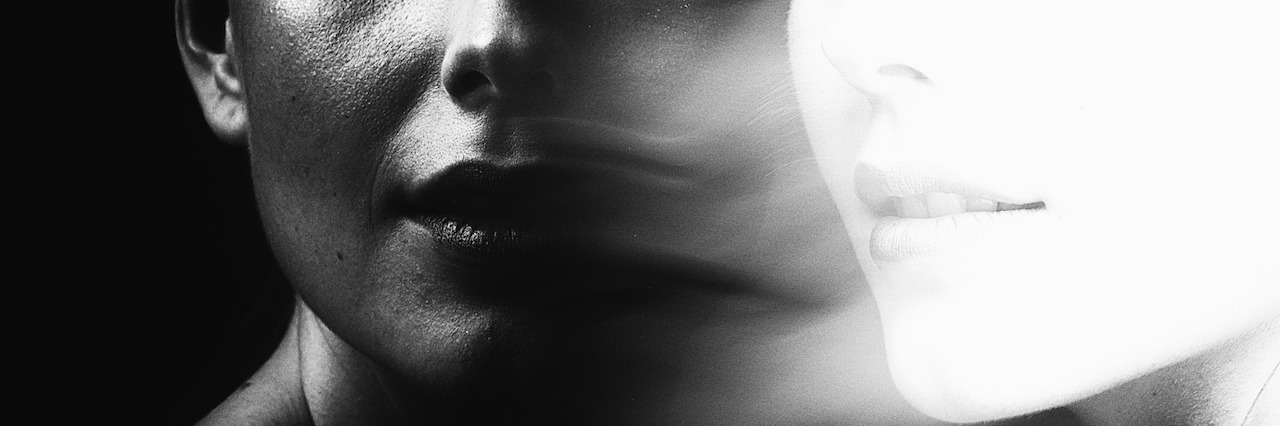 Eating Disorder: Why I Don't Like the Word Recovery A woman's reflection in black and white