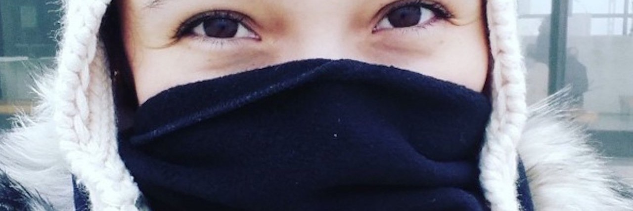 How Winter Affects My Chronic Illnesses woman dressed in winter gear
