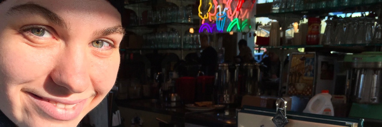 MALS: Strangers React to Daughter's Food Celebration young woman sitting at the bar at a restaurant