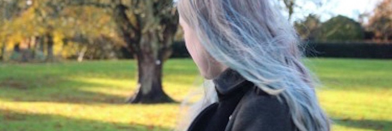 People With Invisible Illnesses Want Your Understanding woman in a park