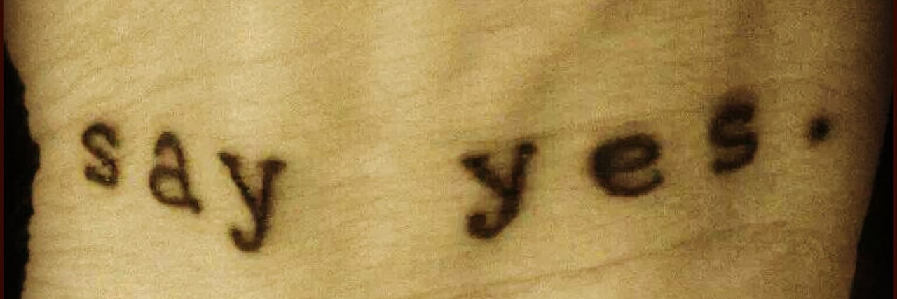 How to Overcome Anxiety When It Holds You Back tattoo that reads: say yes