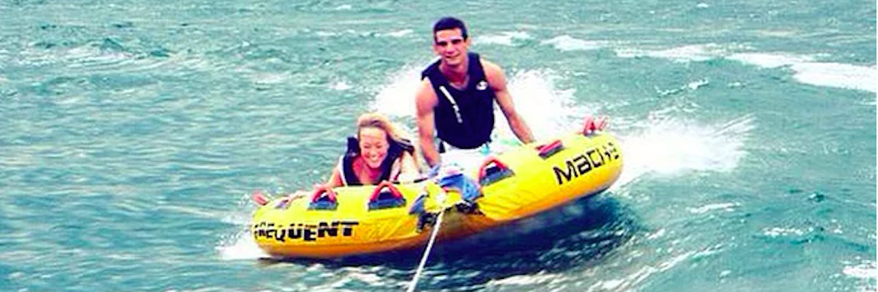 Man With Epilepsy Reacts to Dierks Bentley Song 'Riser' man and woman on raft being pulled by boat