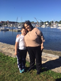 woman with young boy at marina