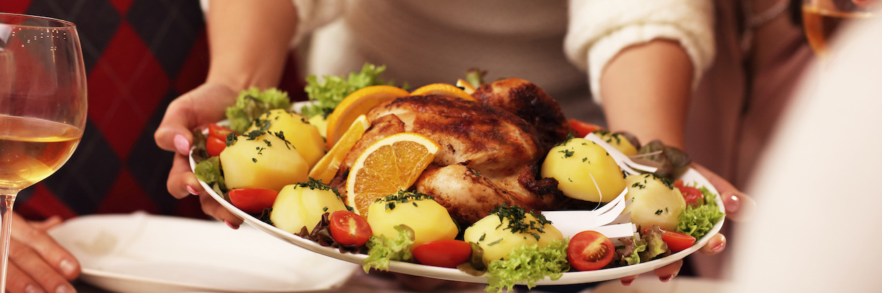My Eating Disorder, Depression and Anxiety Haunt Thanksgiving Memories Picture showing group of friends celebrating Christmas at home