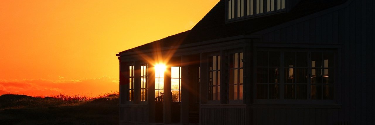 view of a home during sunset