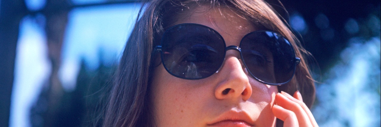 20 Things I Never Thought I'd End Up Doing Until Sjogren's Syndrome woman in sunglasses