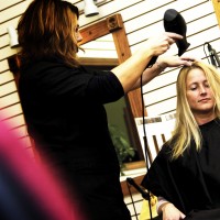 Woman at salon getting her hair done