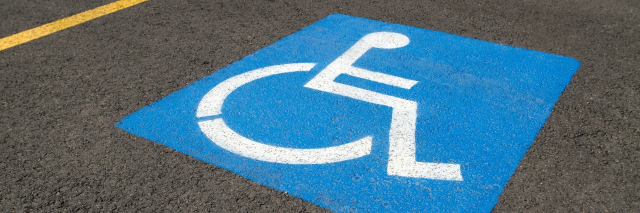 How I Decide If I Need to Use the Disabled Parking Space Low-angle close-up of a handicapped parking space