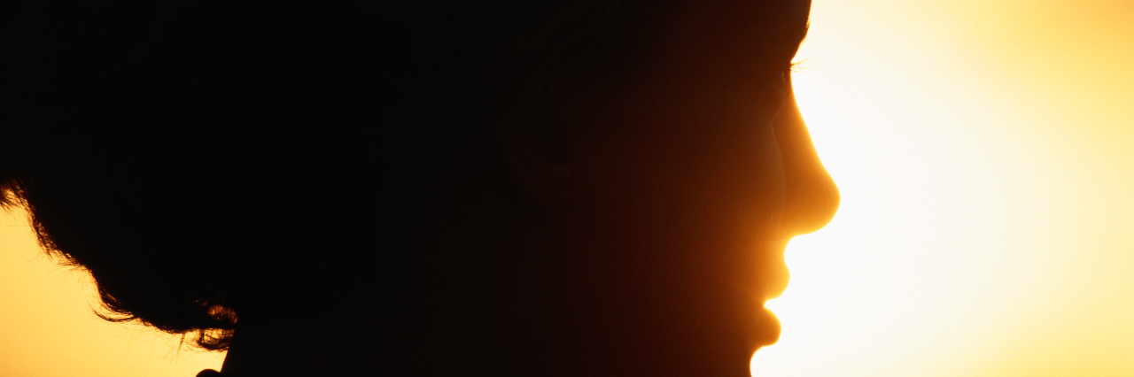 Lessons Cerebral Palsy Has Taught Me Silhouette of woman, close-up.