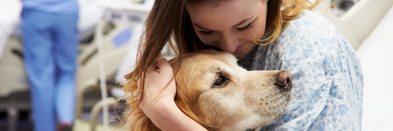 Tips for Introducing a Therapy Pet to Someone With Depression girl with therapy dog