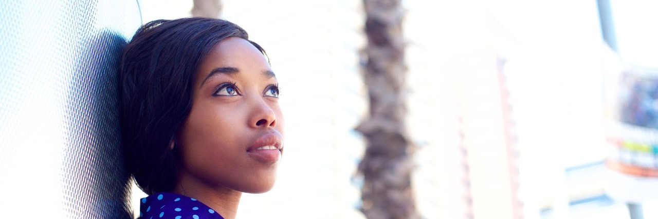 Can I 'Recover' From Mental Illness? Why I Hesitate to Say I Recovered Young business woman standing outdoors thinking